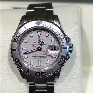Rolex platinum Yacht Master watch.